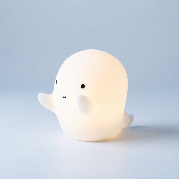 Dinosaur-shaped LED nightlight: cute Dreamasaur lamp for children's bedroom decor, soft glow.