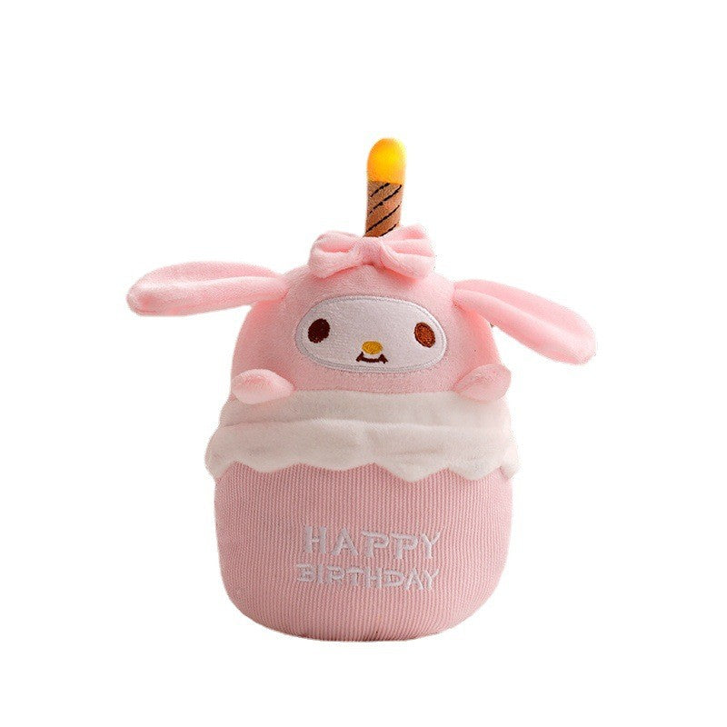Soft musical birthday cake plush with interactive lights & sound, ideal for parties & playtime.