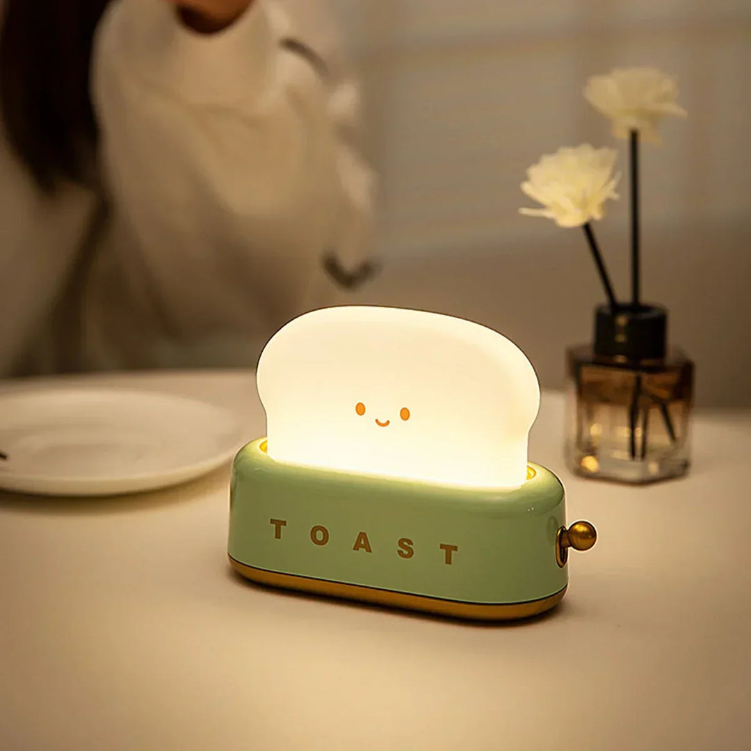 Dimmable LED cute toast night light. Rechargeable USB-C desk lamp with warm glow. Ideal bedroom decor for kids & adults.