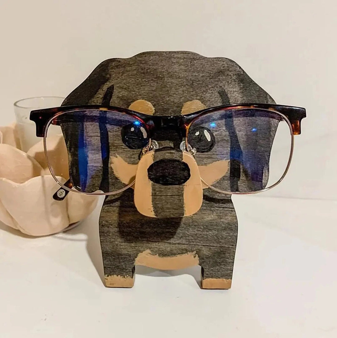 Charming animal eyeglass holder, a whimsical wooden spectacle stand for home or office.