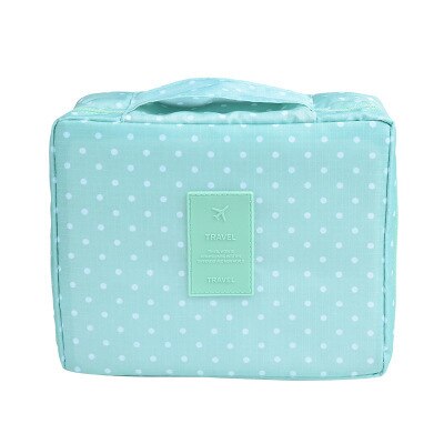 Dark blue floral waterproof makeup travel organizer for women, with bonus mini cosmetic case.