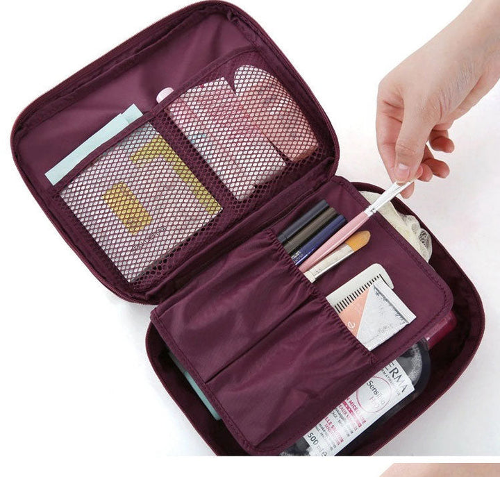 Compact dark blue floral waterproof makeup organizer, essential for travel and daily cosmetic storage.