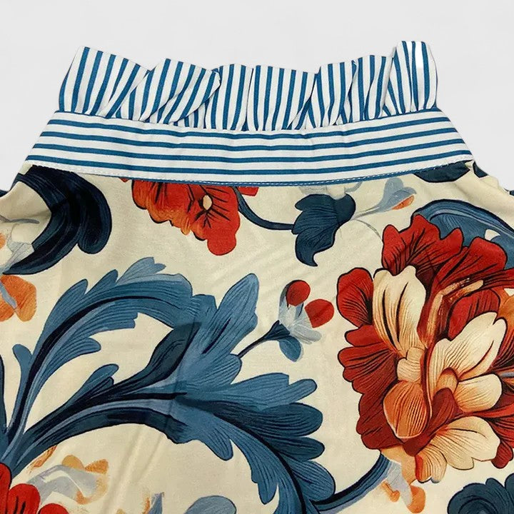 Comfortable dark blue women's blouse with unique 3D floral design. A stylish and modern top for any occasion.