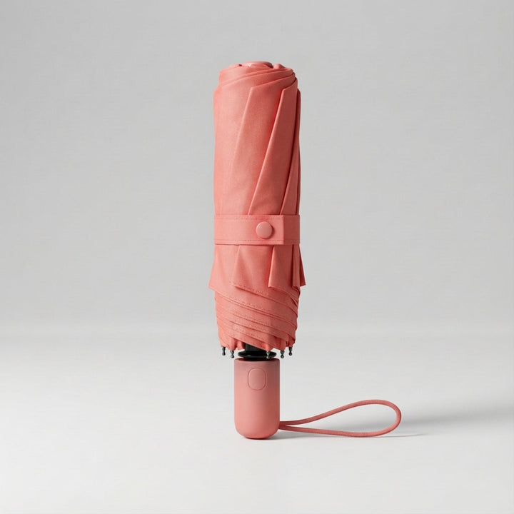 Essential dark green compact travel umbrella. Lightweight, portable outdoor gear with UV protection.