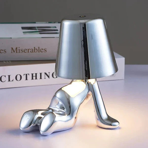 Unique design LED table lamp, rechargeable and dimmable for optimal ambient lighting.