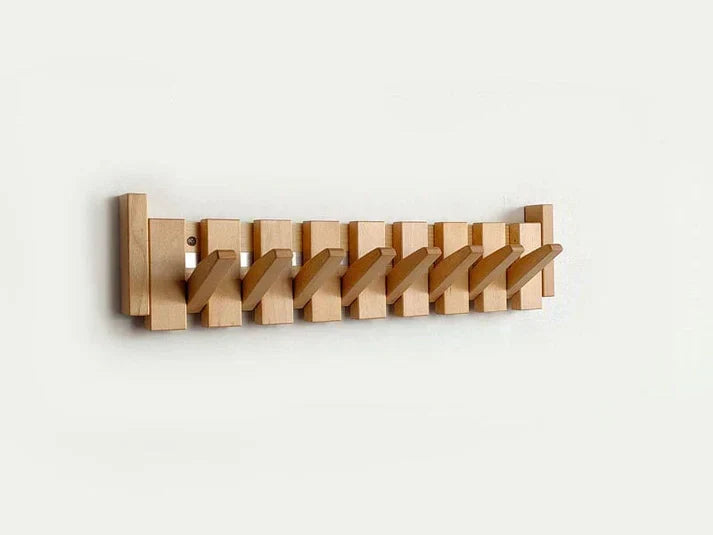 Stylish decorative wooden piano key coat rack. Unique entryway storage with multiple wood hooks.
