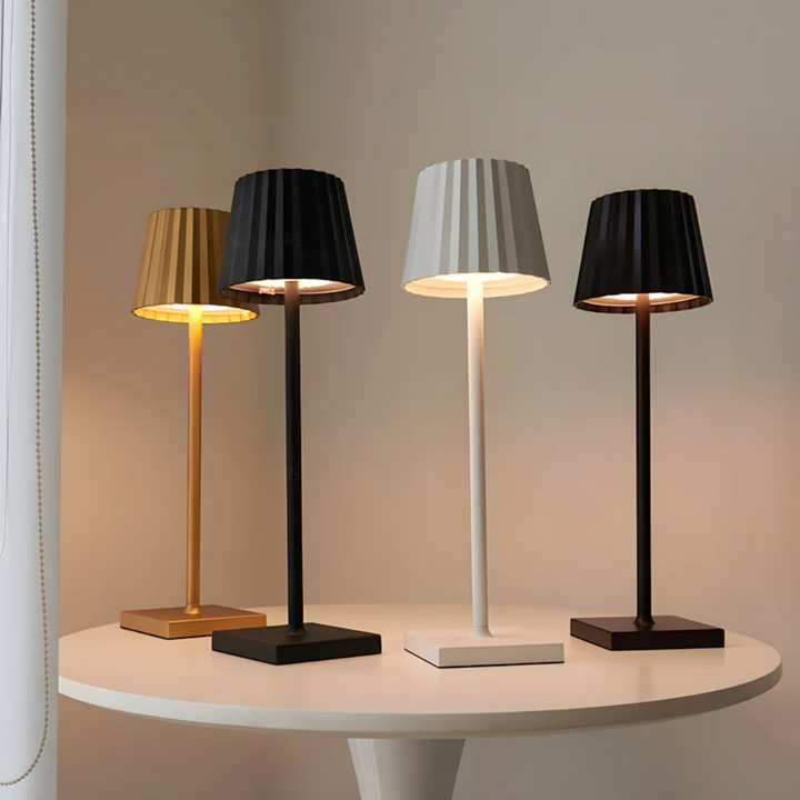 Dimmable touch table lamp, modern LED lighting, portable & rechargeable for home, office, or outdoor use.