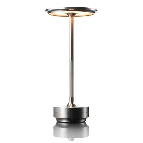 Energy-efficient LED table lamp. Dimmable, wireless, and USB rechargeable for modern home lighting.