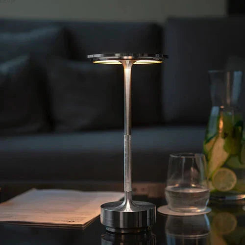 Portable LED table lamp, dimmable and USB rechargeable. Ideal for ambient lighting & any room.