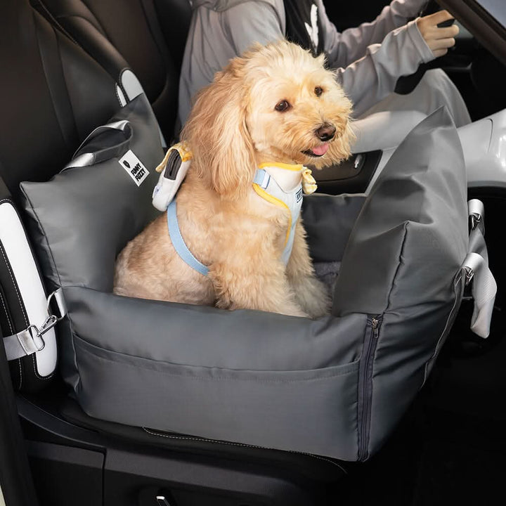 Vehicle pet seat for dogs, designed as a booster with safety belt & non-slip base for stability.