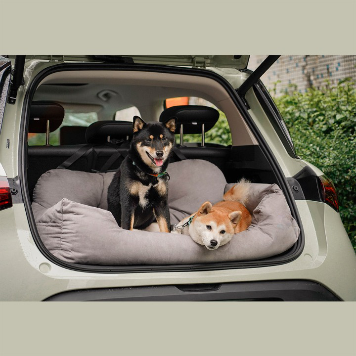 Dog car back seat travel bed for secure and comfy pet journeys. PawsRest luxury dog bed ensures safety & comfort.