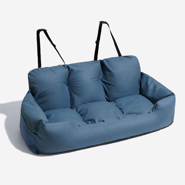 Plush grey PawsRest dog car bed, secure and comfy, designed for back seat pet travel safety & luxurious comfort.
