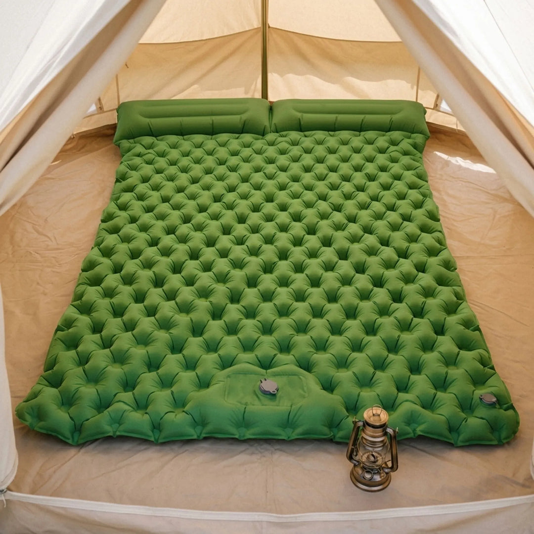 Double camping air mattress for comfortable outdoor sleeping in tents. Portable & inflatable for travel.