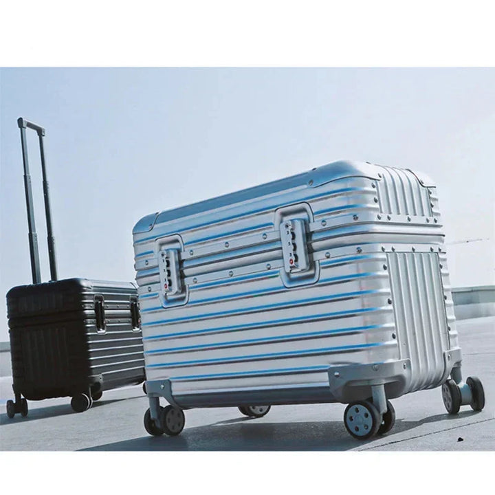 Robust silver aluminum travel bag with 360-degree spinner wheels, ideal for frequent flyers.