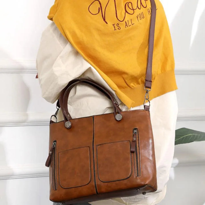 Stylish women's tote bag. Classic, organized & durable everyday handbag, perfect as a fashion accessory.