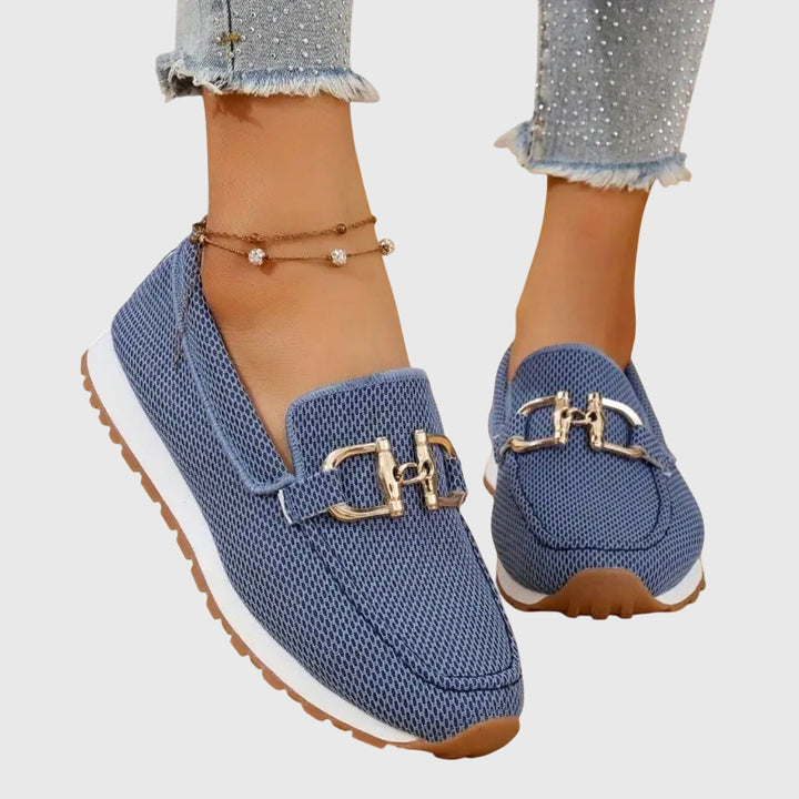 Dusty blue women's slip-on horsebit loafers with cushioned sole. Comfortable everyday fashion footwear.