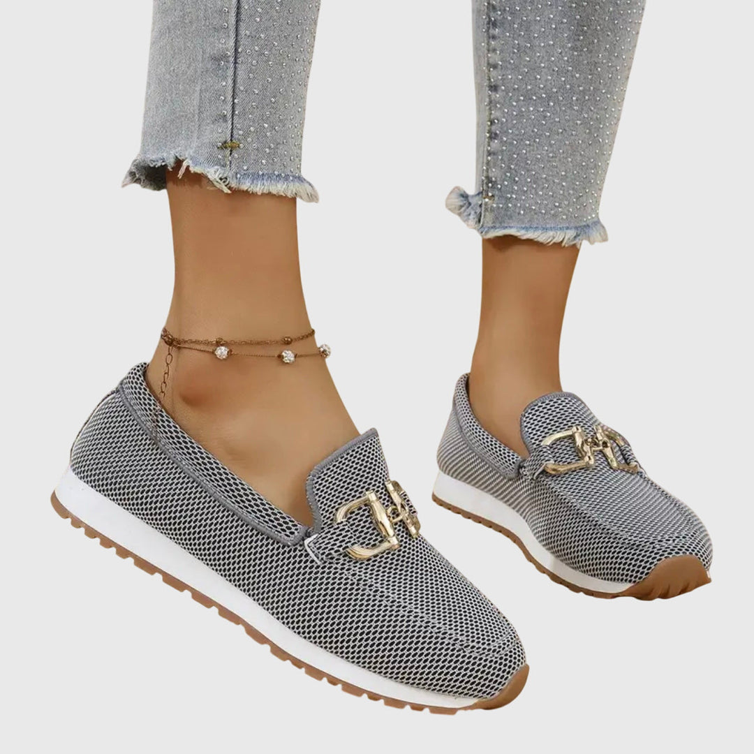 Women's dusty blue horsebit loafers. Comfortable slip-on shoes with a cushioned sole for everyday style.