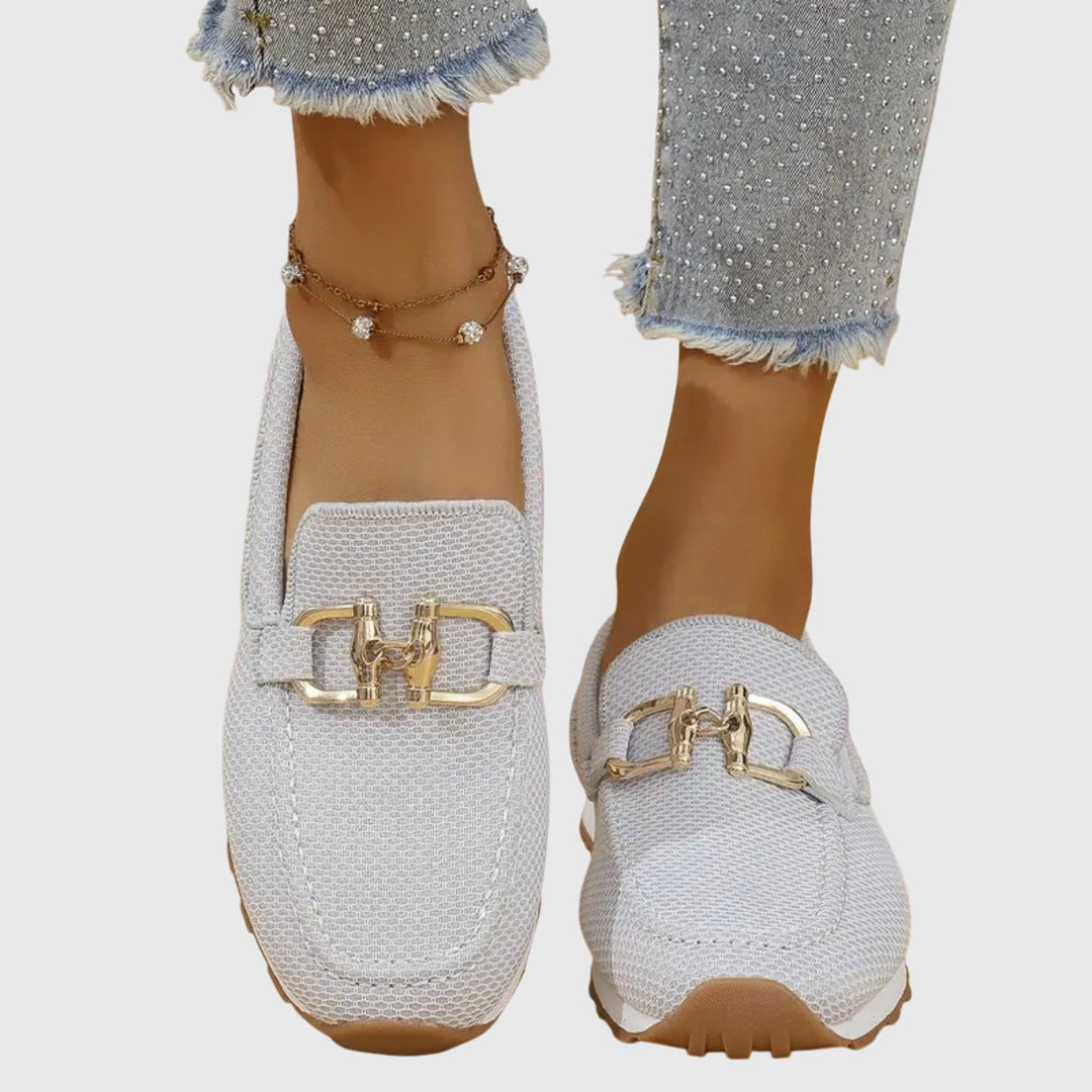 Women's fashion dusty blue horsebit loafers. Slip-on comfort flats with a cushioned sole, preppy style.