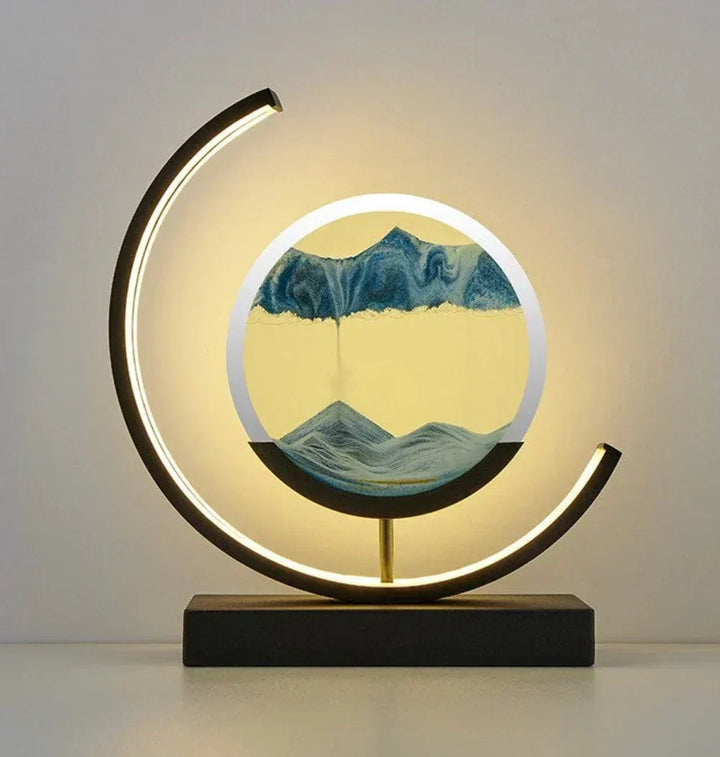 Moving sand art lamp creating a mesmerizing dynamic sandscape, perfect for desktop decor & relaxation.