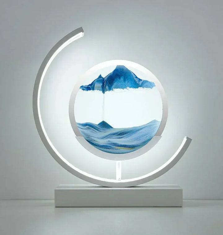 Ambient light table lamp with dynamic moving sand art, ideal for unique home and desktop decor.