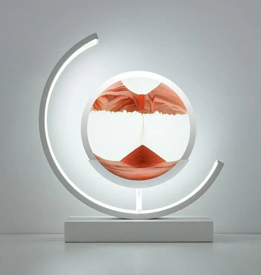 Mesmerizing moving sand art lamp, a dynamic sandscape table lamp providing calming ambient light.
