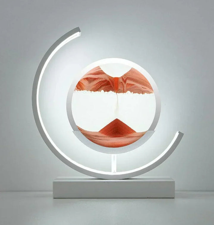 Mesmerizing moving sand art lamp, a dynamic sandscape table lamp providing calming ambient light.