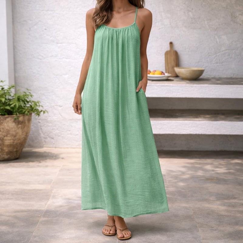 Women's scoop neck maxi dress, an effortless spaghetti strap design for casual summer fashion.