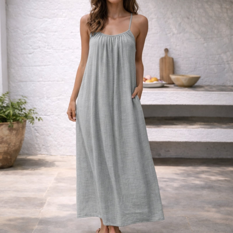 Effortless summer maxi sundress for women, with comfortable spaghetti straps & a scoop neck.