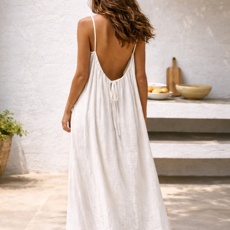 Stylish women's vacation dress: spaghetti strap maxi sundress with convenient pockets.