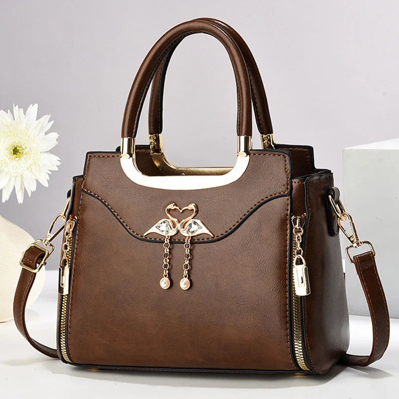 Elegant black structured handbag for women, versatile fashion accessory.