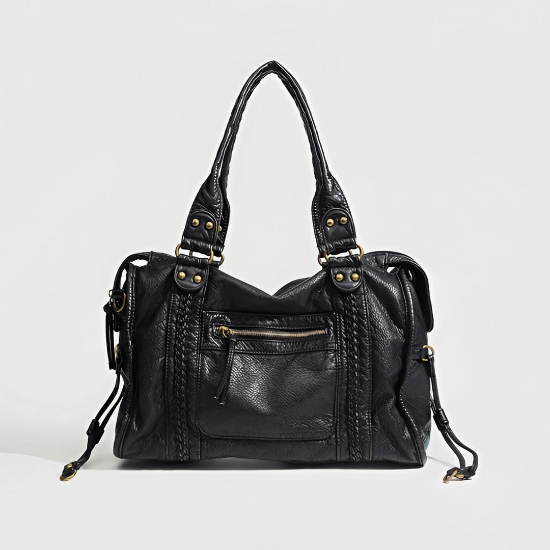 Stylish black women's shoulder bag, can also be worn as a crossbody. Features a sophisticated design for daily use.