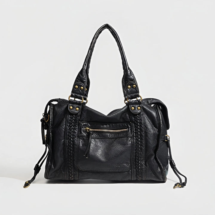 Stylish black women's shoulder bag, can also be worn as a crossbody. Features a sophisticated design for daily use.