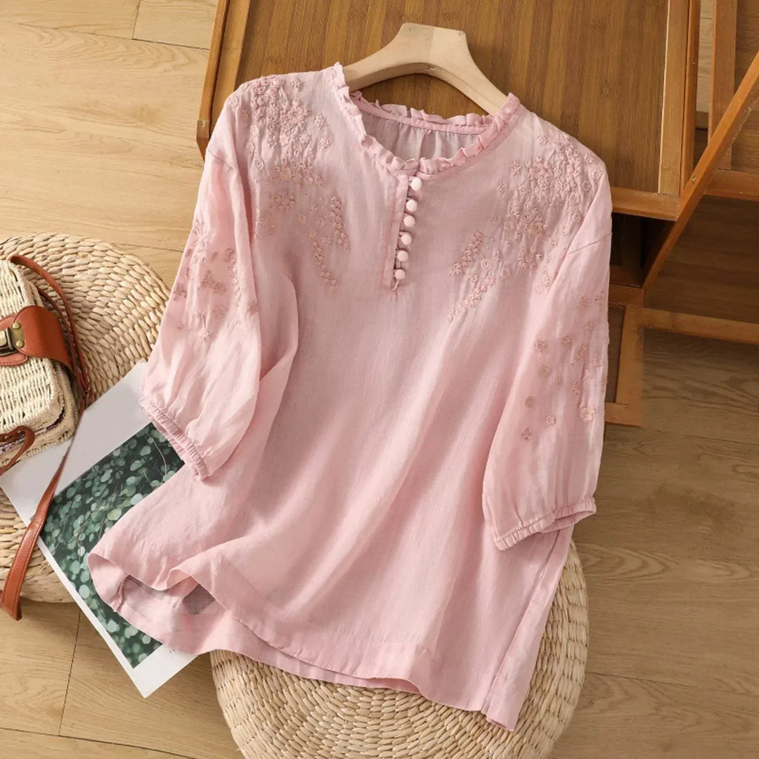 Embroidered floral button-front blouse, elegant women's long sleeve top, perfect for spring/summer fashion.