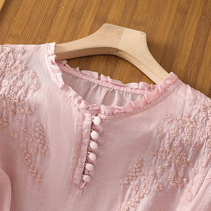 Chic women's floral print button-front blouse, long sleeve, ideal elegant top for spring & summer fashion.
