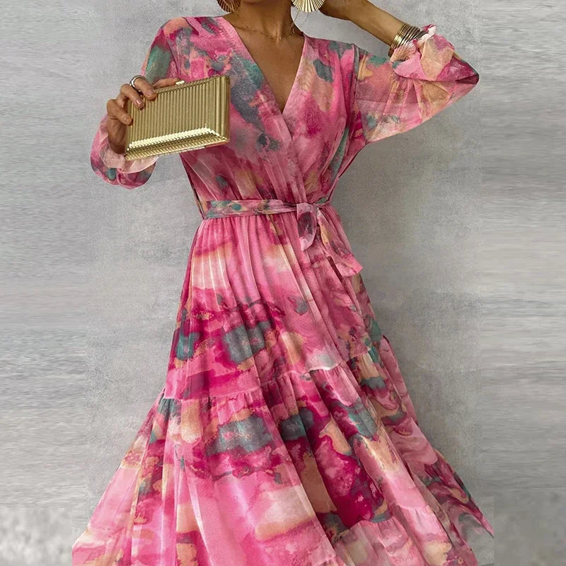Flowy long floral maxi dress with an elegant classic design for women, ideal for party or casual wear.