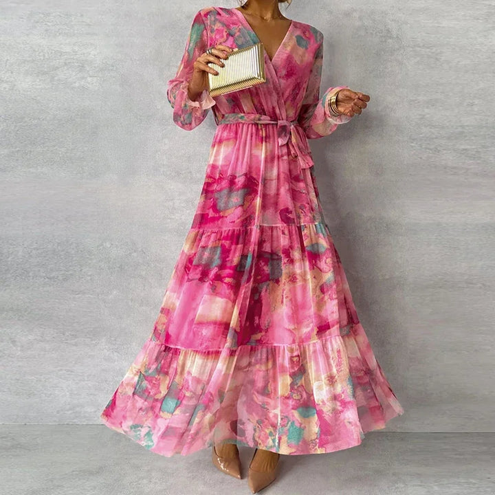 Long elegant floral maxi dress with a classic feminine silhouette for women's special occasions.