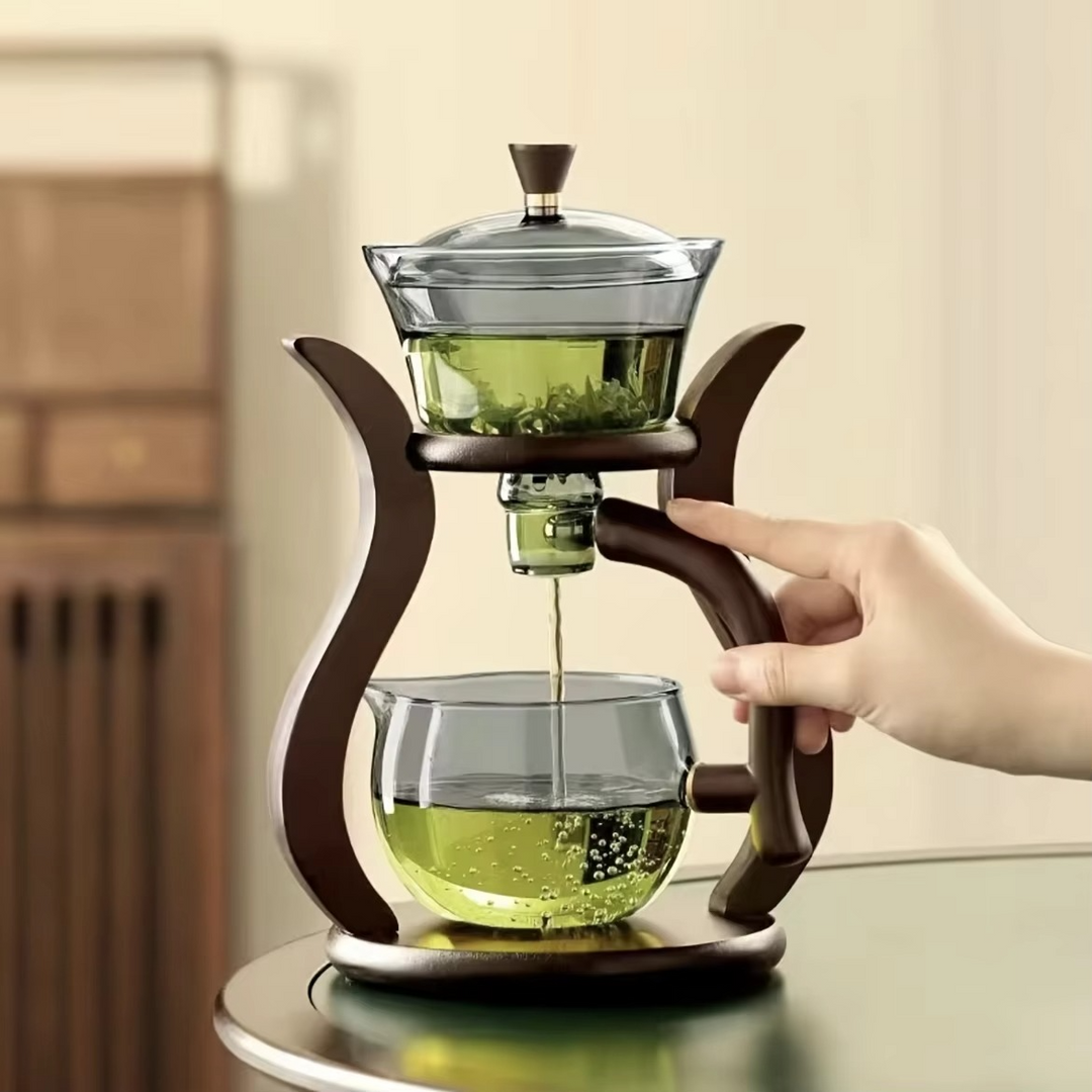 Elegant glass pour over coffee & tea pot with handle, perfect for home brewing loose leaf tea or manual coffee.