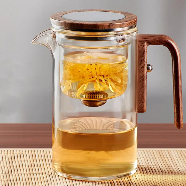 Elegant glass teapot with infuser for loose leaf tea and water separation technology.