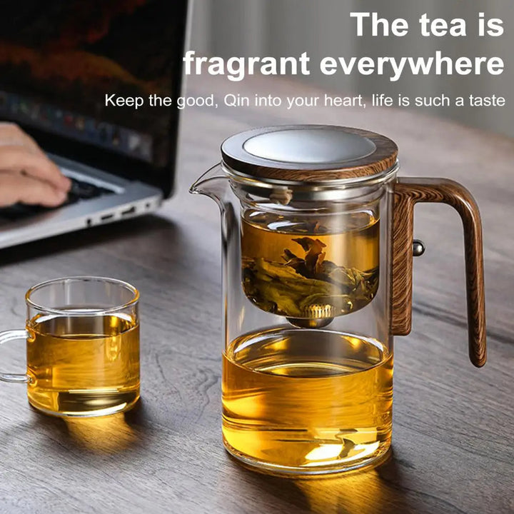 Elegant glass teapot, a perfect gift for tea lovers, features a tea infuser & water separation.