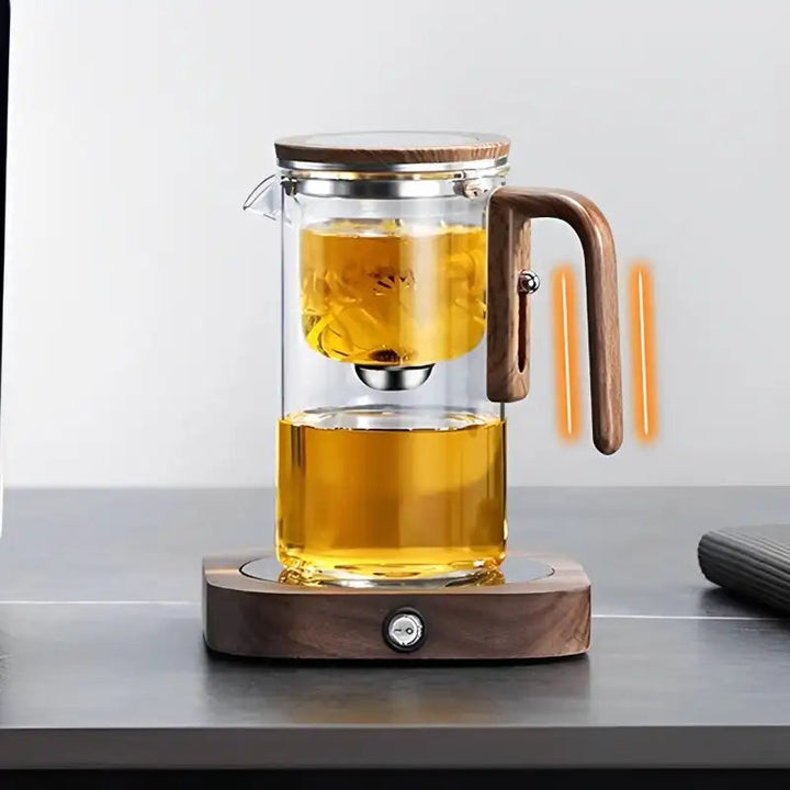 Clear glass teapot with removable infuser for easy loose leaf tea brewing & water separation.