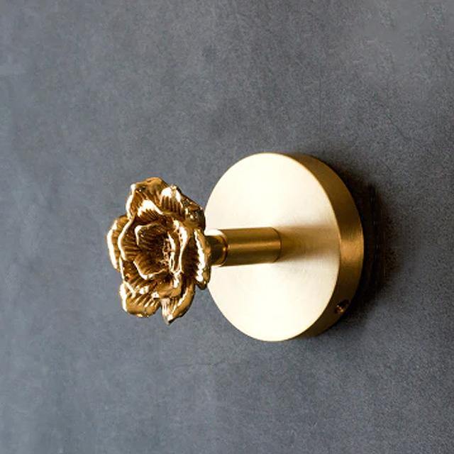 Charming gold animal hook, perfect for enhancing your home's wall decor.