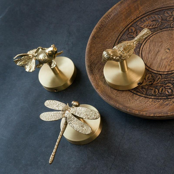 Stylish gold animal wall hook, an accent piece for modern interior wall decor.