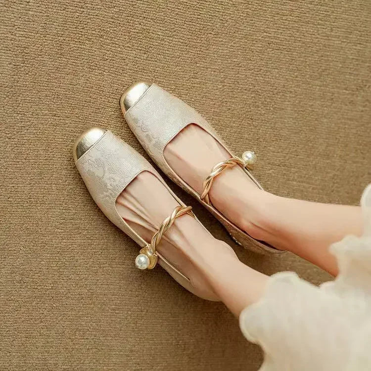 Sophisticated women's square toe pumps with a chic studded heel, ideal for special occasions.
