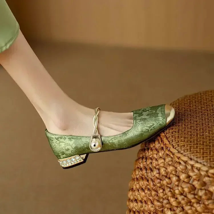 Chic black square toe pumps for women with a stylish studded heel. Comfortable dress shoes for any event.