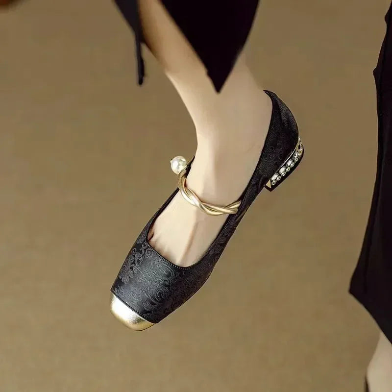 Fashionable beige square toe pumps for women, perfect for adding an elegant touch with its studded heel.