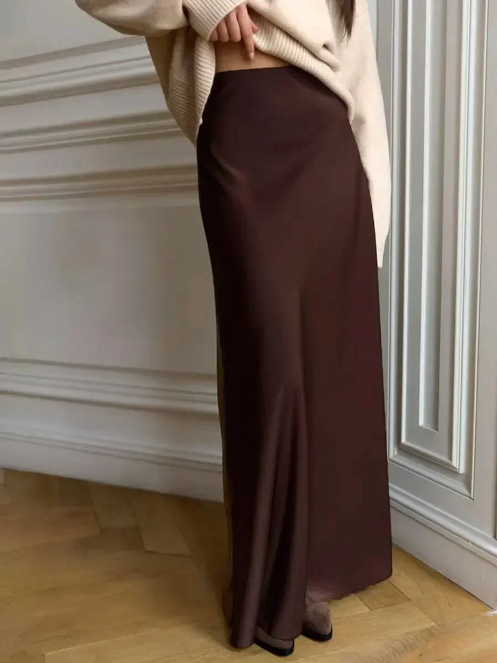 Flowy high waist fishtail maxi skirt for women, offering elegant style for evening events.