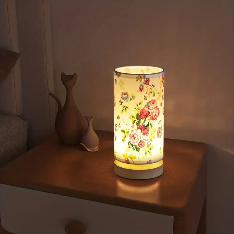 Elegant linen look night light, LinoGlow, for bedrooms. Features a subtle floral design & ambient glow.