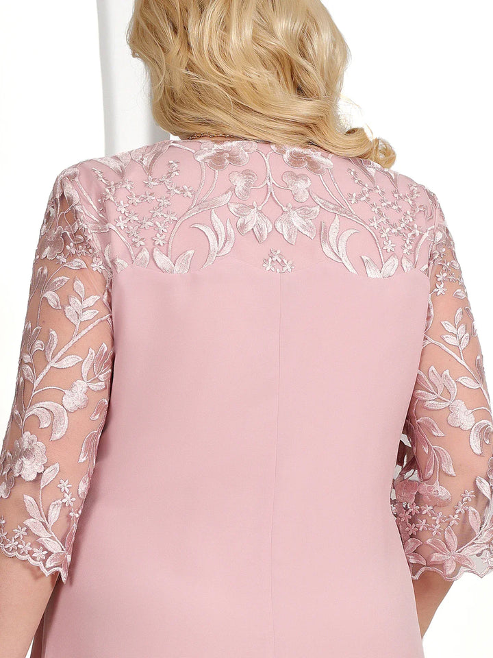 Women's plus size long embroidered banquet dress. Elegant curvy fashion, sheer sleeves for special evening occasions.