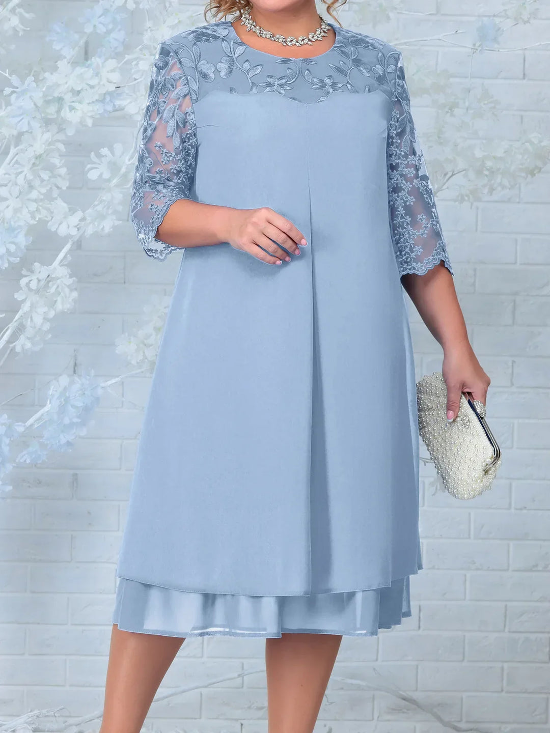 Plus size long embroidered dress featuring elegant sheer sleeves. Beautiful banquet gown for formal women's evening wear.