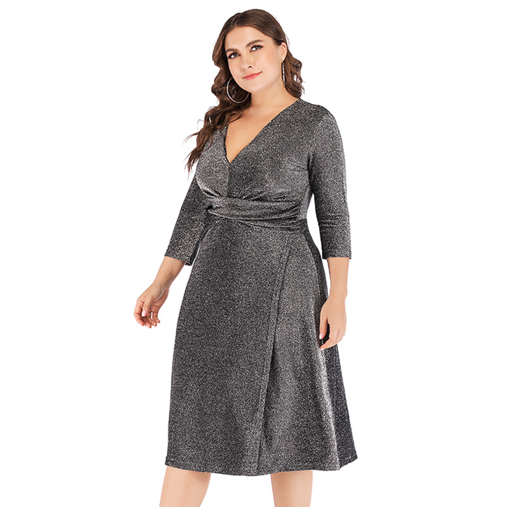 Chic women's plus size long sleeve glitter dress. An elegant wrap style perfect for evening parties & holidays.